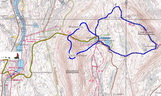 Äkäskero mit Lodge, Hundecamp, Schneeschuh-Touren (blau) und Wander-Routen (grün)